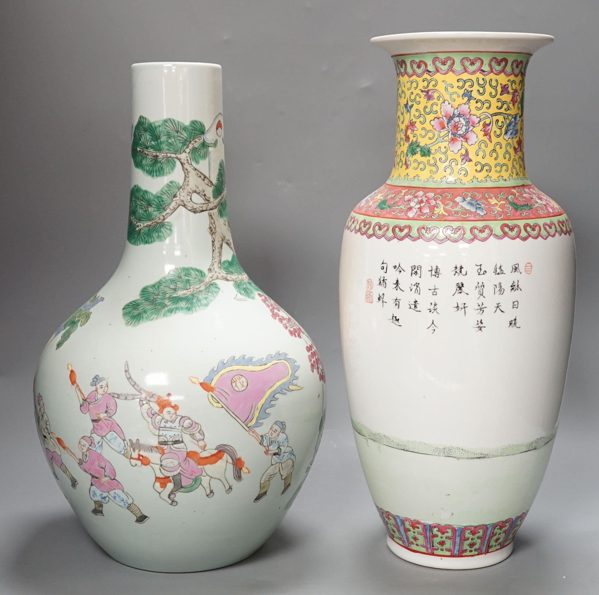 Two Chinese famille rose vases, tallest 42 cms high.